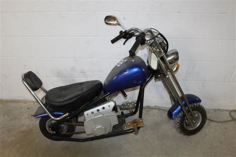 Designed by west coast choppers founder jesse james, this bike looks just like a real chopper. "West Coast Choppers" Mini Bike | Property Room