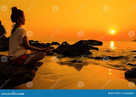 Sunset Yoga Woman With Spirituality On Sea Coast Stock Image Image Of