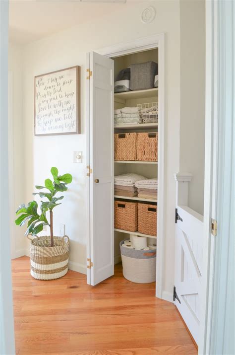 This front hall closet idea only requires a container or two! Small linen closet makeover. Organized linen closet ...