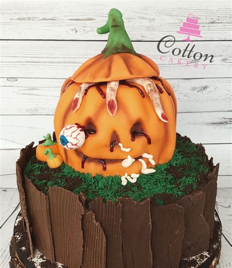 Spooky Halloween cake with a creepy pumpkin patch and zombie pumpkin! | Spooky halloween cakes ...