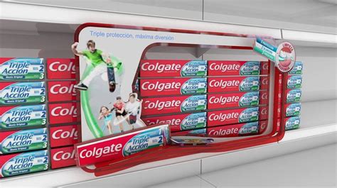 An Advertisement For Colgate Toothpaste Is Displayed On The Wall In A Store