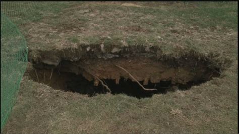 Backyard Sinkhole Uncovers Underground Structure
