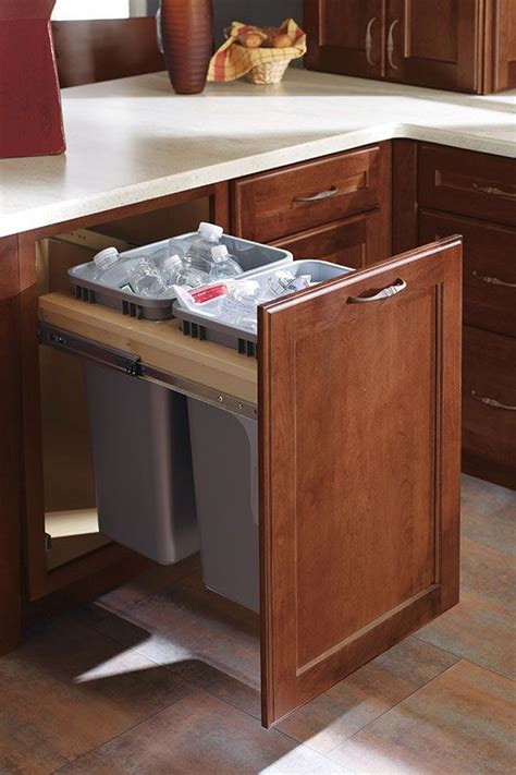 This Trash Pull Out Cabinet Is Perfect For Dividing Recyclables Or