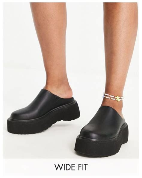 asos wide fit milo chunky flat mules in black lyst uk