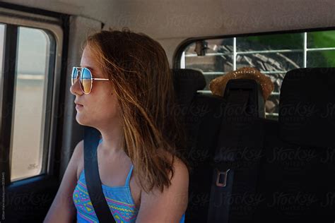 Young Teen In Car At The Beach By Stocksy Contributor Gillian Vann