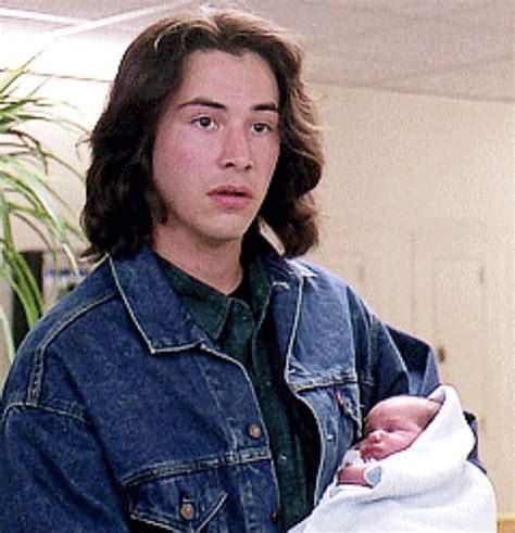 Keanu Looking Like A Baby While Holding One From Parenthood 1989