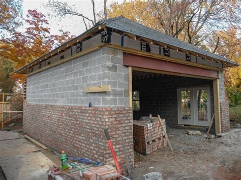 Brick Veneer Being Installed At New 24′ X 26′ Garage In City Of
