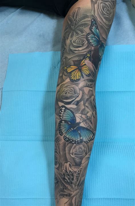 Butterflies And Roses Sleeve Tattoos