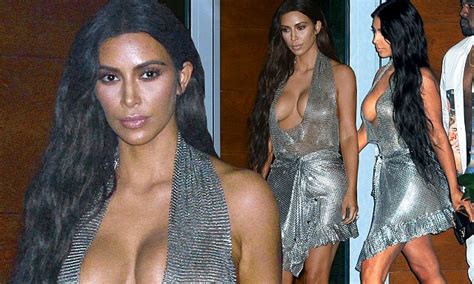 Kim Kardashian Upstages Kanye At Own Concert In Miami With Cleavage Revealing Dress Daily Mail