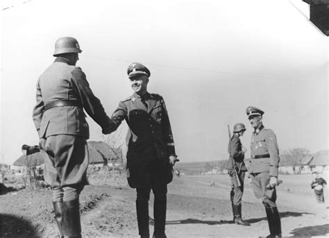 Reichsfuehrer Ss Heinrich Himmler Shakes Hands With A Member Of The