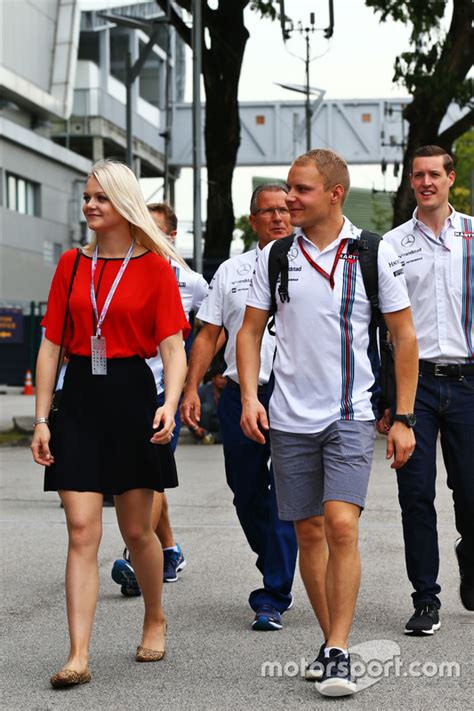 Does valtteri bottas have tattoos? Valtteri Bottas, Williams with his wife Emilia Bottas at ...