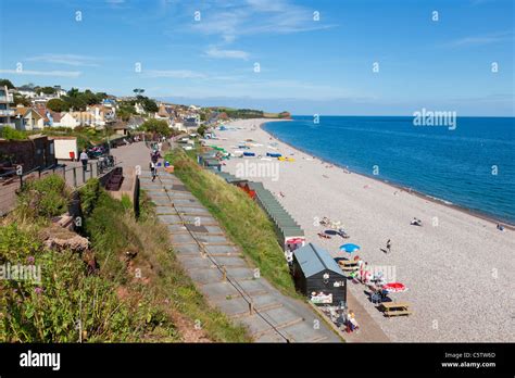 Pebble Beach And Bathing Huts At Budleigh Salterton Beach Devon England Uk Gb Europe Stock Photo