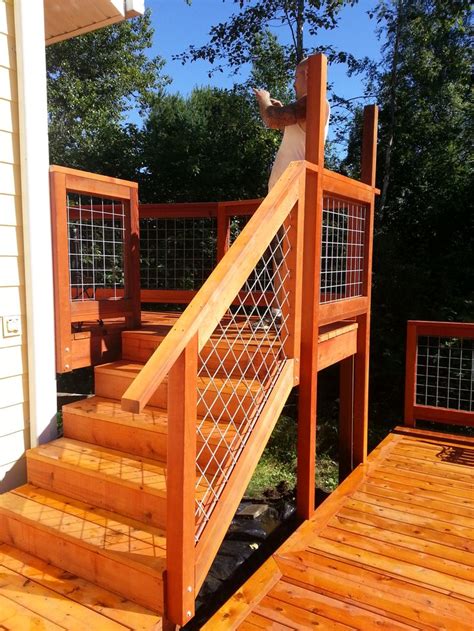 Custom Cedar Deck With Hog Wire Handrails In Bellingham Wa By Devine