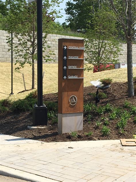 Custom Wayfinding Signage With Faux Corten Steel And Dimensional