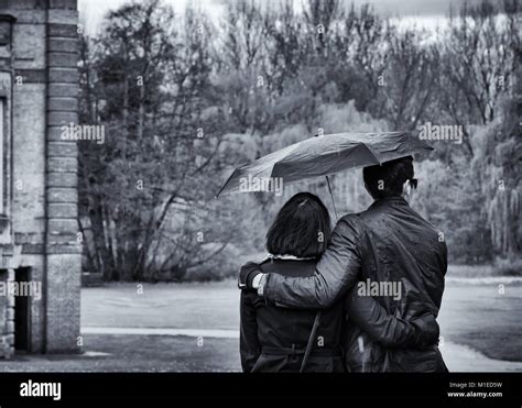 Couple Walking In The Rain Black And White