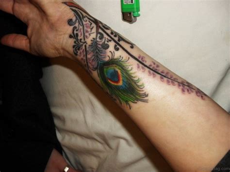 31 Awesome Peacock Feather Tattoos On Wrist