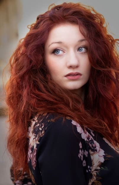 Premium Photo A Beautiful Woman With Red Hair