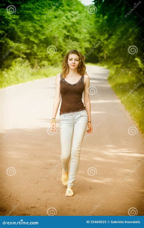 Young Woman Walking In The Countryside Stock Image Image Of Hair Girl 25460025