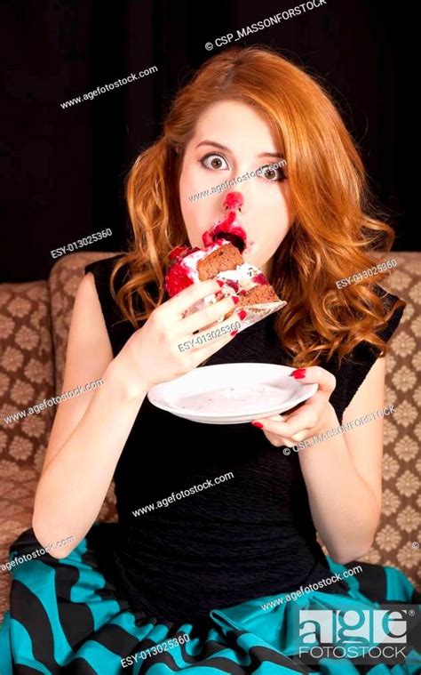 Redhead Girl Secretly Eating Cake Stock Photo Picture And Low Budget Royalty Free Image Pic