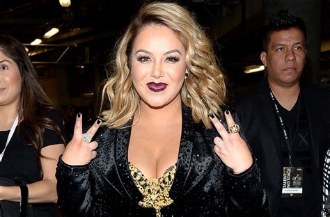 Chiquis Rivera Takes Off Her Coat And Sensually Moves Her Rear To The Rhythm Of Hip Hop