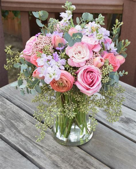 Some of our most popular flower bouquets include: Flower bouquet in a vase: ranunculus, roses, lisianthus ...