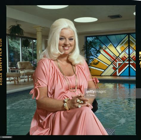 actress diana dors photographed at home by a swimming pool circa news photo getty images