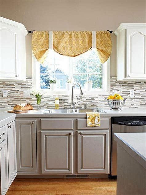 Bring your kitchen cabinets up to date with frameless cabinets painted in contemporary colors such as white, gray and other soft shades. Stylish Two Tone Kitchen Cabinets for Your Inspiration ...