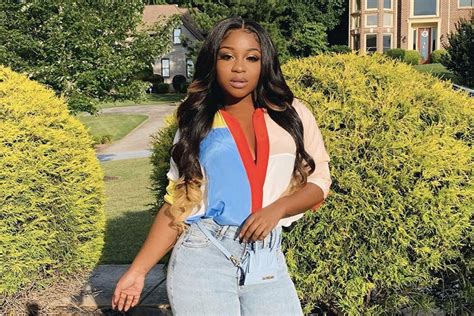 Reginae Carter Shows Off Her Cleavage In This Clip And Fans Say She