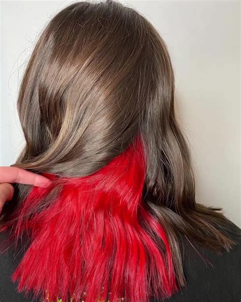 Red Hair Underneath Black Fashion Hairstyle