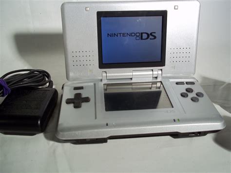 nintendo ds original ntr 001 console w charger games titanium silver on ebid new zealand