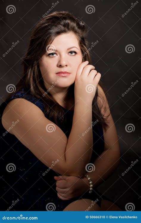 Portrait Of Beautiful Brunette Plus Size Young Woman Stock Photo