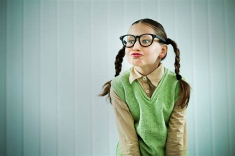 Beautiful Nerd Girl Pouting Her Lips Stock Photo Download Image Now