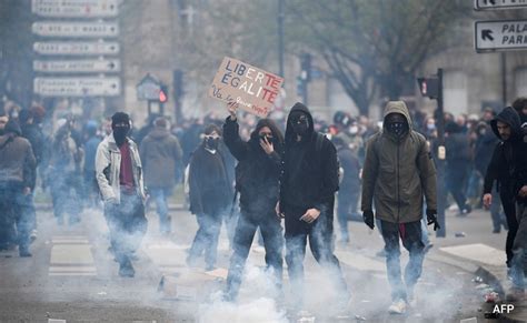 over 740 000 protest against france s pension reforms clash with police