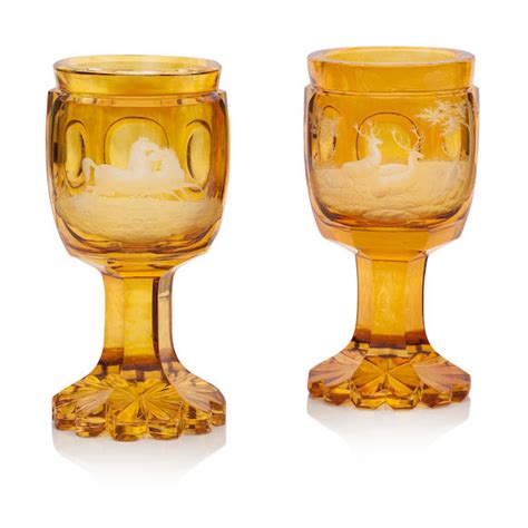 Bonhams A Pair Of Bohemian Amber Stained Engraved Goblets Circa 1900