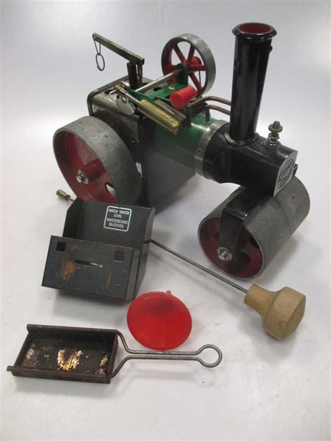 A Boxed Mamod Live Steam Model Roller Together With Two Shooting