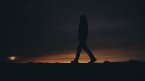 Lonely Man Walking Alone On Stock Footage Video (100% Royalty-free) 1026880796 | Shutterstock