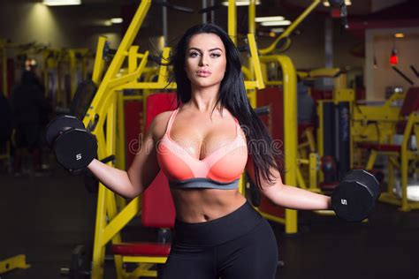 Fitness Woman Doing Sport Workout In The Gym With Dumbbells Stock Image Image Of Pilates