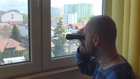 Looking On Home Window Young Man With Binoculars Spy Neighbors Naughty