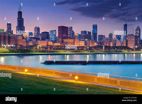 Chicago Skyline Image Of Chicago Skyline At Night With Reflection Of