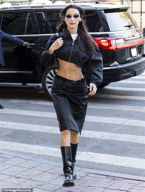 bella hadid looks fierce as she puts her defined abs on display in itty bitty cropped jacket
