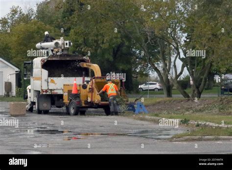 Workers Cleaning Up After Wind Storm Weather Event Stock Photo Alamy