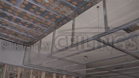 Installed via a suspended grid panel into which ceiling tiles are fixed, suspended ceilings are relatively easy to put up, and they also come in diy project kits. Building Vertical Drywall Ceiling Drops | Suspended ...