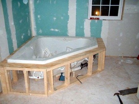 His plumber felt it necessary to try to discredit us and stated that the tile should have been installed after the tub. how to Install a Jacuzzi Tub (With images) | Corner ...