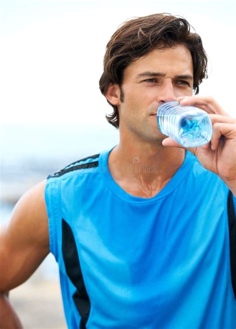 Ensure You Drink Enough Water During Training A Young And Fit Man