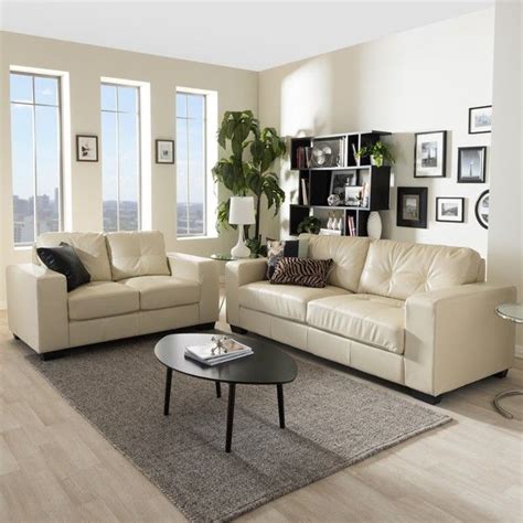 And they're both tested and approved for tear strength, flexibility and color fastness, so you can enjoy these sofas for many years. Baxton Studio Whitney Modern Ivory Faux Leather Sofa and ...