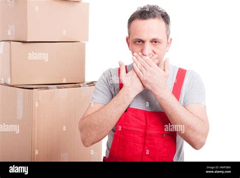 mover guy covering his mouth like no speaking or mute gesture isolated on white background stock