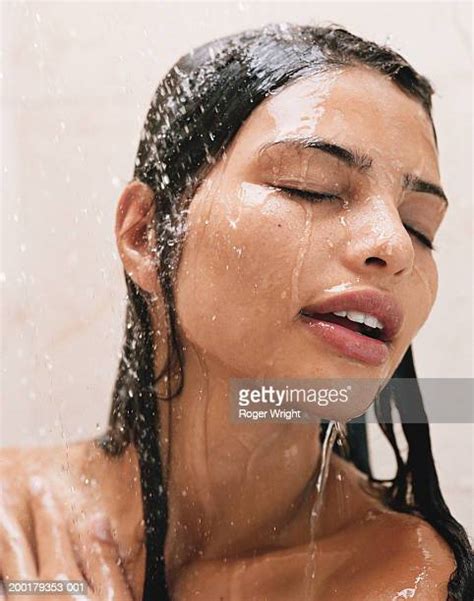 wet hair shower photos and premium high res pictures getty images