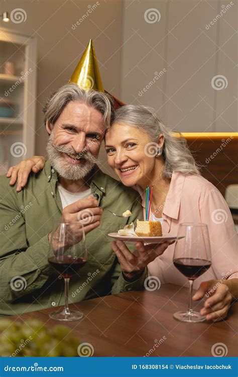 Joyous Handsome Man Sitting In The Kitchen Stock Photo Image Of Male
