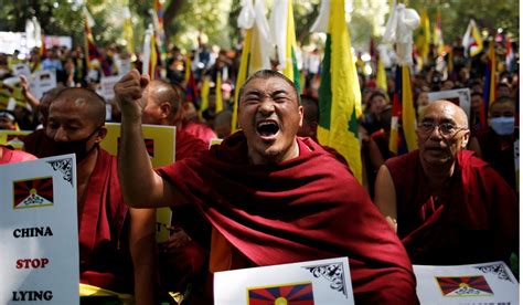 Thousands Of Tibetans Protest On 60th Anniversary Of Uprising Against