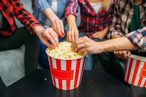 Group Of People Eating Popcorn In Cinema Stock Photo Image Of